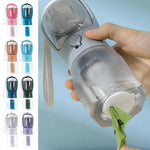 Dog travel water bottle with built-in food storage compartment